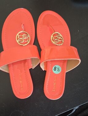 bebe Coral Patent Slide Sandals with Gold Medallion
